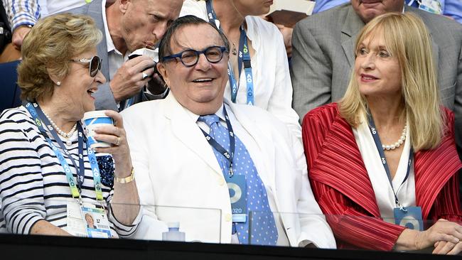 Barry Humphries, centre, and wife Lizzie Spender, right, at Rod Laver Arena.