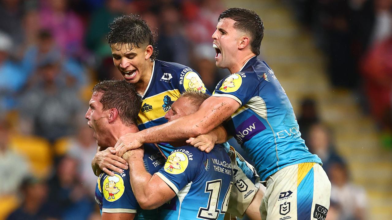 Jarrod Wallace of the Titans celebrates scoring a try. Photo by Chris Hyde/Getty Images