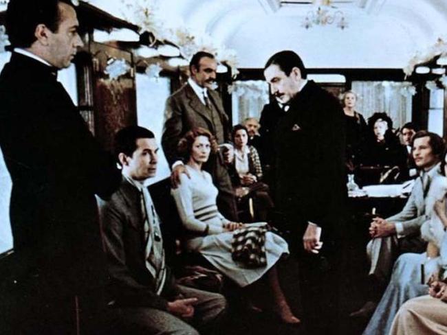 Albert Finney, centre, as Hercule Poirot in Murder On The Orient Express 1974. Picture: Supplied