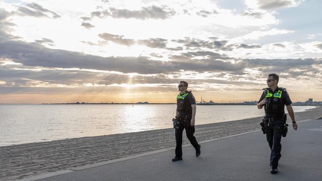 Police officers on patrol along the St Kilda foreshore yesterday. Picture: Asanka Ratnayake/Getty Images