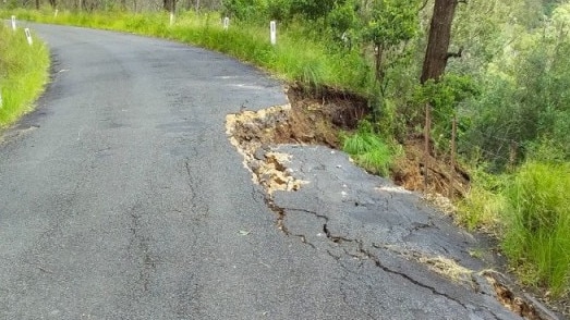 Old Razorback Rd has suffered damage during multiple flood events in 2022.