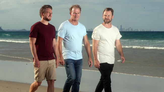 Filmmaker Jason Markland (centre) with Josh Martin (right), the brother of Fingal drowning victim Ryan, and Ash Witty, the local surfer who plays the fallen hero in <i>Rip Current Heroes. </i>Photo: Richard Gosling