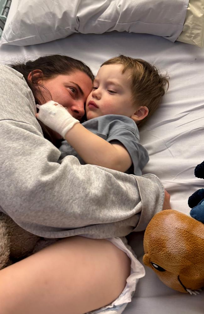 Mum Ebony Hurford cuddles her son Harlyn in hospital as he fights cancer