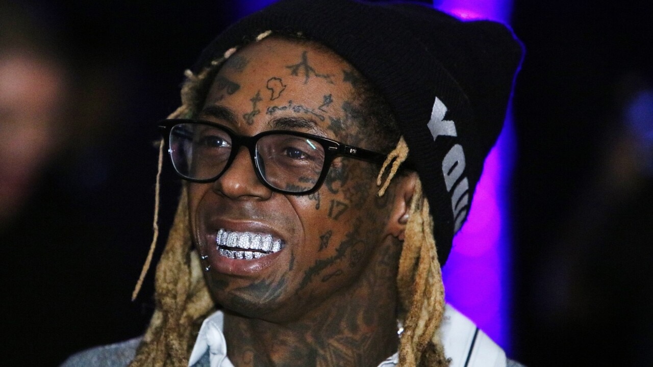 President Trump pardons American rapper Lil Wayne 