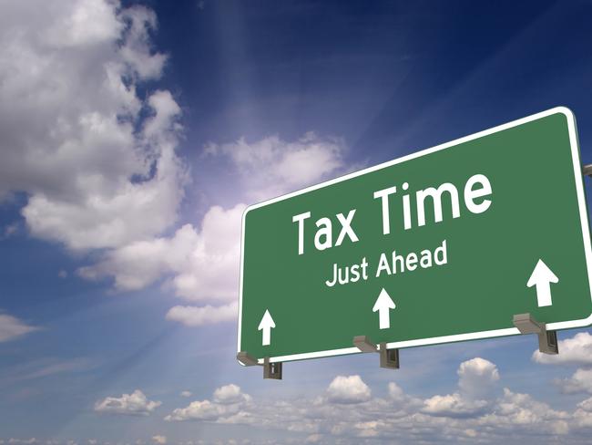 Tax time ahead road sign concept