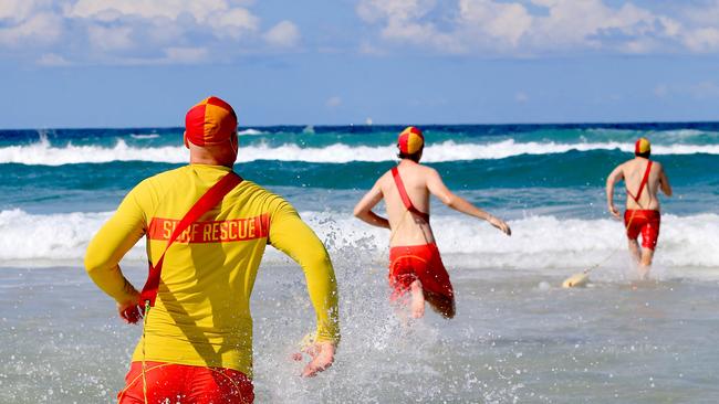 A MAN was pulled from the water by lifeguards at Miami Beach today. Pic Tim Marsden