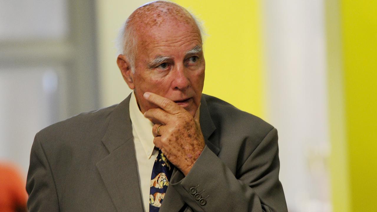 FILE - In this Feb. 9, 2015, file photo, former grand slam tennis doubles champion Bob Hewitt is shown outside a Johannesburg, South Africa court. In an unprecedented step, the International Tennis Hall of Fame has expelled Grand Slam doubles champion Bob Hewitt, who was convicted in South Africa last year of rape and sexual assault. The Hall of Fame announced its decision Wednesday, April 6, 2016. Hewitt, who was inducted in 1992, is the first member expelled. (AP Photo/File)