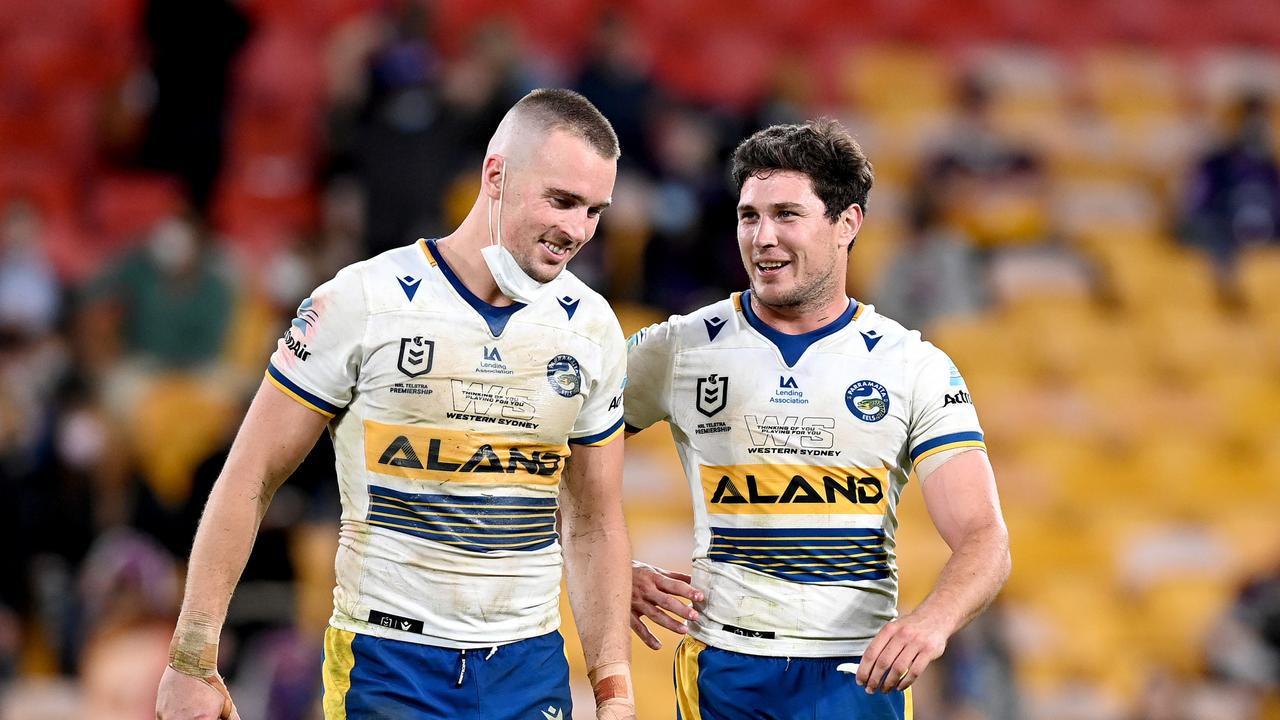 BRISBANE, AUSTRALIA - AUGUST 28: Clint Gutherson and Mitchell Moses of the Eels are seen enjoying their victory after the round 24 NRL match between the Melbourne Storm and the Parramatta Eels at Suncorp Stadium, on August 28, 2021, in Brisbane, Australia. (Photo by Bradley Kanaris/Getty Images)