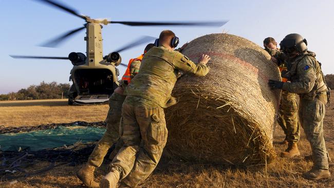 Chinook helicopters from the Australian Army's 5th Aviation Regiment have been helping to quicky pick up and drop off hay to feed livestock at hard to reach properties on Kangaroo Island as part of Operation Bushfire Assist 2019-2020.