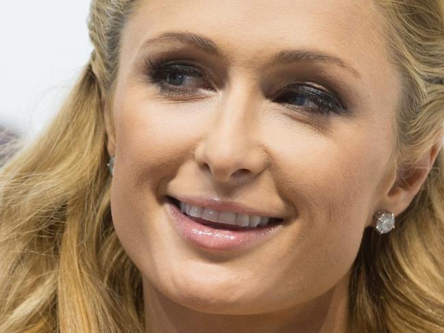 (FILE) A file picture taken on August 28, 2015 shows US celebrity Paris Hilton at a press meeting during the second edition of the International Fashion Fair in Ptak Fashion City in Rzgow near Lodz, Poland. The well-known hotel empire heiress lost, an approx. 100 thousand dollar worth ring with diamonds, which she lost on her return journey to the airport after the International Fashion Fair in Ptak Fashion City in Rzgow near Lodz. The Ring was found in an airport bus by Mieczyslaw Cieslaczyk, a firefighter working in the Lodz airport. The Ring, in compliance with all safety procedures, will be delivered to Paris by the Ptak Holding head of security where it will be pick by representatives of the artist's management. AFP PHOTO / PAP / GRZEGORZ MICHALOWSKI +++ POLAND OUT EASTNEWS OUT