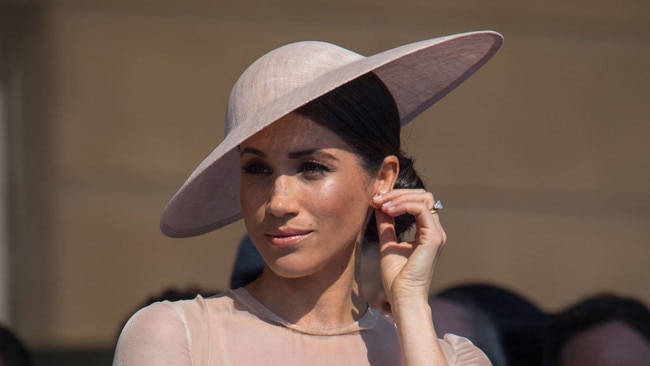 The Duchess of Sussex was allegedly desperate to leave during a garden party in May 2018: Picture: Dominic Lipinski/PA Images via Getty Images.