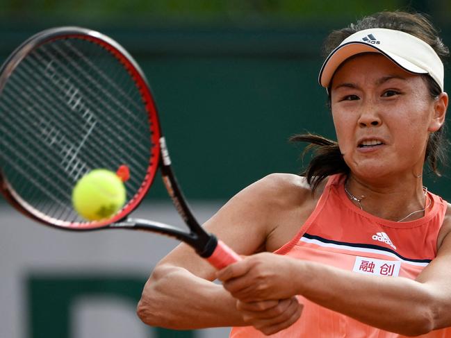 (FILES) In this file photo taken on May 29, 2018, China's Peng Shuai hits a return against Serbia's Aleksandra Krunic during their women's singles first round match on day three of The Roland Garros 2018 French Open tennis tournament in Paris. - The head of the Women's Tennis Association "remains deeply concerned" about Chinese star Peng Shuai, following her accusations of sexual assault against a powerful politician, a spokeswoman told AFP on November 28, 2021. (Photo by Eric Feferberg / AFP)