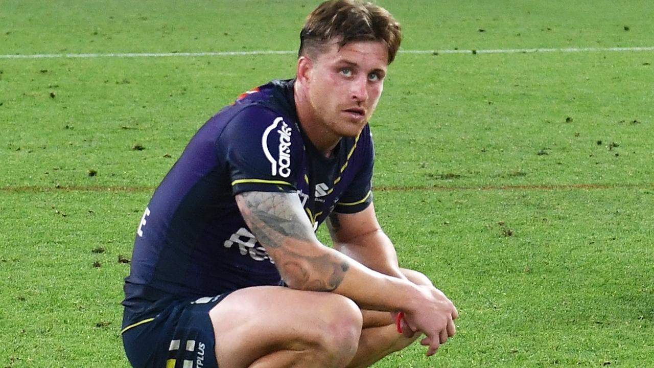 BRISBANE, AUSTRALIA - SEPTEMBER 25: Cameron Munster and Harry Grant of the Storm looks dejected after defeat during the NRL Preliminary Final match between the Melbourne Storm and the Penrith Panthers at Suncorp Stadium on September 25, 2021 in Brisbane, Australia. (Photo by Bradley Kanaris/Getty Images)