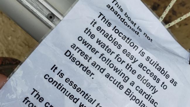 A heartbreaking note attached to a catamaran owned by elderly sailor who was forced to move his boat from the foreshore after a council crackdown on watercraft. Picture: supplied