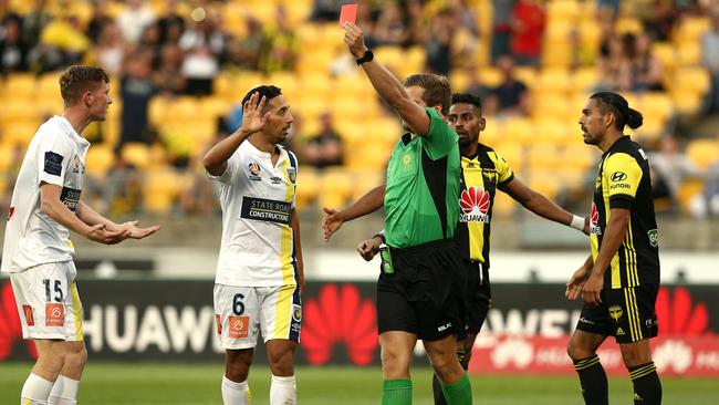 Kye Rowles, left, is sent off during the Central Coast Mariners’s loss to Wellington Phoenix on Saturday. Picture: Getty Images