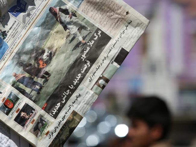 Newspapers hang for sale at a stand carrying headlines about the former leader of the Afghan Taliban, Mullah Akhtar Mansoor, who was killed in a US drone strike last week, in Kabul, Afghanistan. Picture: AP