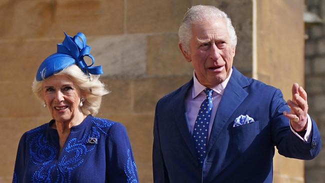 Britain's King Charles III (R) and Britain's Camilla, Queen Consort arrive for the Easter Mattins Service at St. George's Chapel, Windsor Castle on April 9, 2023. (Photo by Yui Mok / POOL / AFP)