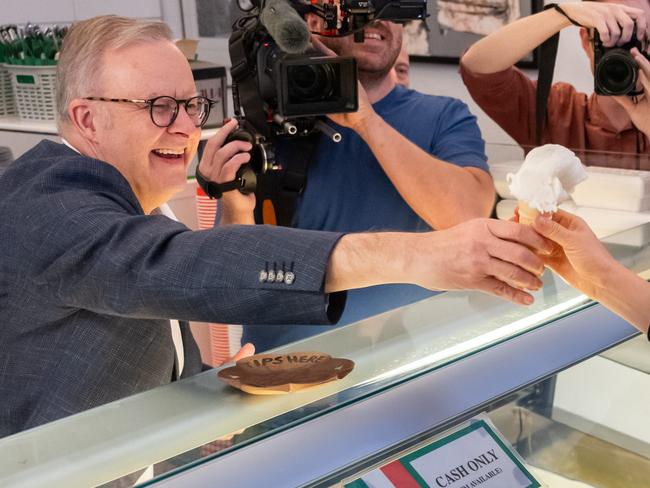 SYDNEY, AUSTRALIA - NewsWire Photos - Sunday, 4 May 2025:Prime Minister Anthony Albanese pictured serving Ice cream at Bar Italia, Norton Street, Leichhardt after having coffee with supporters.Picture: NewsWire / Monique Harmer