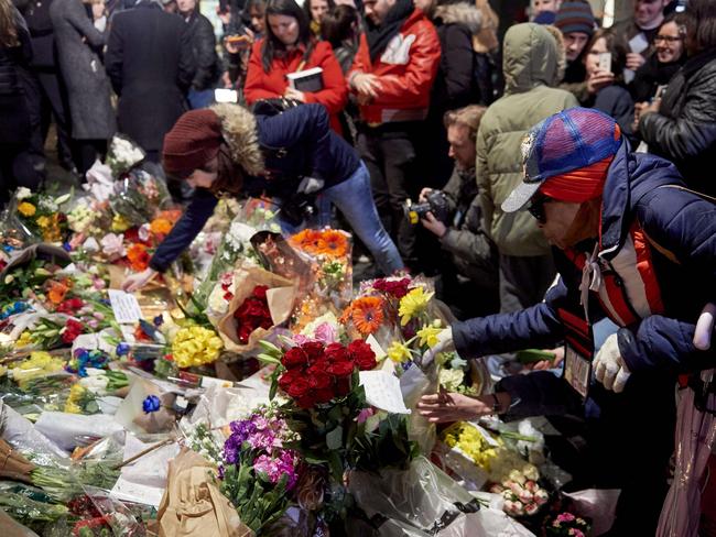 Tribute ... Crowds gathered in Brixton to pay tribute to the legend, David Bowie. Picture: AFP Photo/Niklas Halle’n