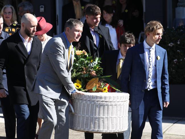 Jim Ferry, Annika’s dad, and mourners carry her casket from the church. Picture: John Grainger