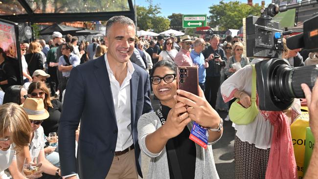 Premier Peter Malinauskas poses for a selfie at a press conference at the Norwood Food and Wine Festival. Picture: Brenton Edwards