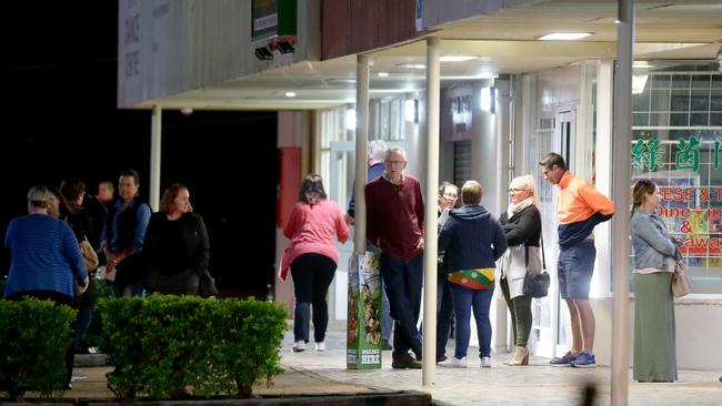 Parents gather outside Kimberley College’s ‘company member’ meeting on Monday night. Picture: mage AAP/Steve Pohlner