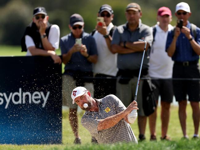 Australiaâs Marc Leishman plays a shot out a bunker during the first round of the Australian Open golf tournament at The Lakes Golf Club in Sydney on November 30, 2023. (Photo by DAVID GRAY / AFP) / -- IMAGE RESTRICTED TO EDITORIAL USE - STRICTLY NO COMMERCIAL USE --