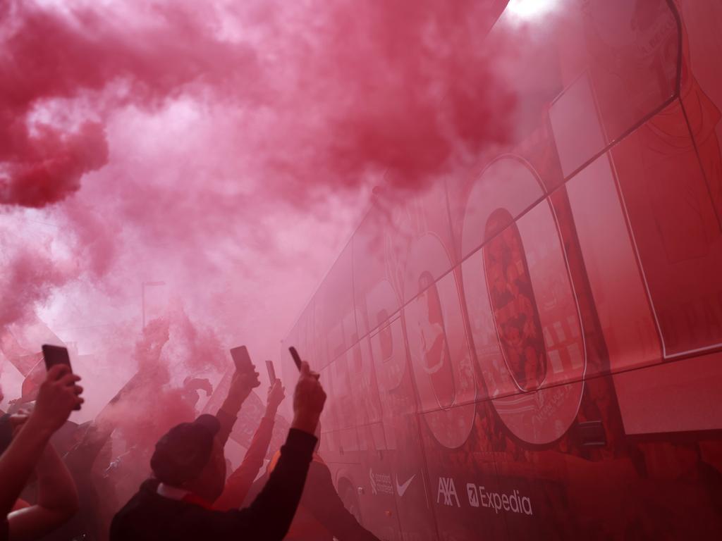 Liverpool’s team bus is welcomed. Picture: Carl Recine/Getty Images