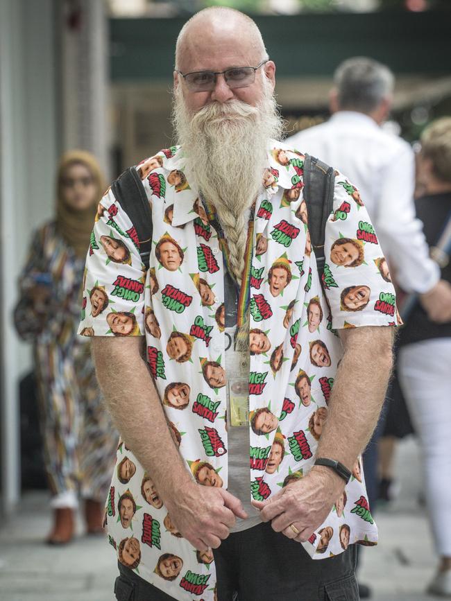 Tony Rowe dressed in the Christmas spirit in Brisbane’s CBD. Picture: NewsWire / Glenn Campbell