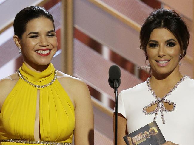 In this image released by NBC, America Ferrera, left, and Eva Longoria present an award at the 73rd Annual Golden Globe Awards at the Beverly Hilton Hotel in Beverly Hills, Calif., on Sunday, Jan. 10, 2016. (Paul Drinkwater/NBC via AP)