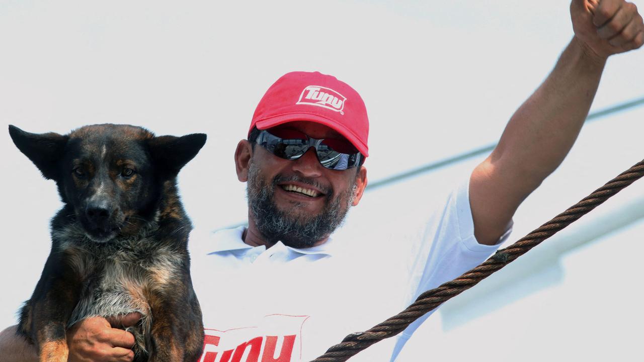 Bella will now live with a member of the trawler’s crew. (Photo by ULISES RUIZ / AFP)