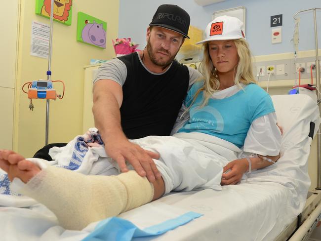 Shark Bite Victim Kirra-Belle Olsson with dad Jamie. Pic: Mark Evans