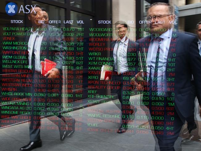 SYDNEY, AUSTRALIA - Newswire Photos -November 14, 2022 A general view of members of the public walking past the digital boards at the ASX in Sydney. Picture: NCA Newswire / Gaye Gerard