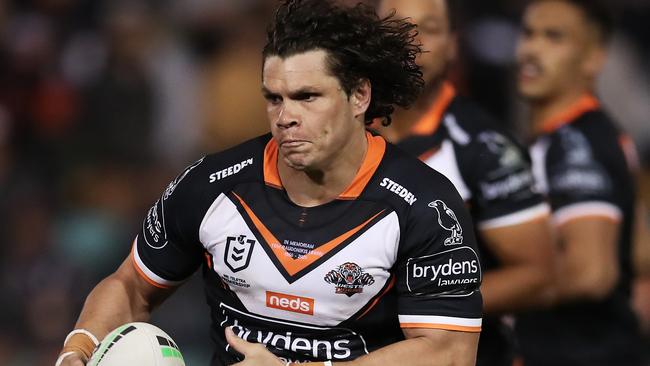 SYDNEY, AUSTRALIA - APRIL 11: James Roberts of the Tigers runs with the ball during the round five NRL match between the Wests Tigers and the North Queensland Cowboys at Leichhardt Oval, on April 11, 2021, in Sydney, Australia. (Photo by Matt King/Getty Images)