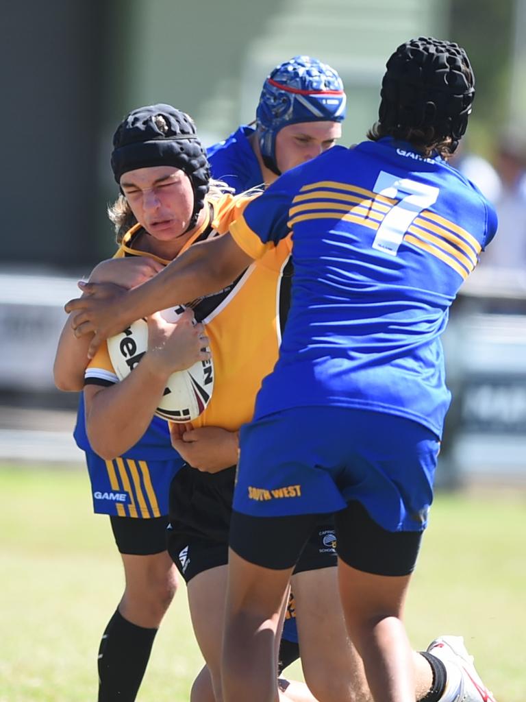 Boys Rugby League State Championship held at Northern Division, Brothers Leagues ground, Townsville. 14-15 years. Capricornia (gold) v South West (blue). George Gofton of St Patrick's College, Mackay.