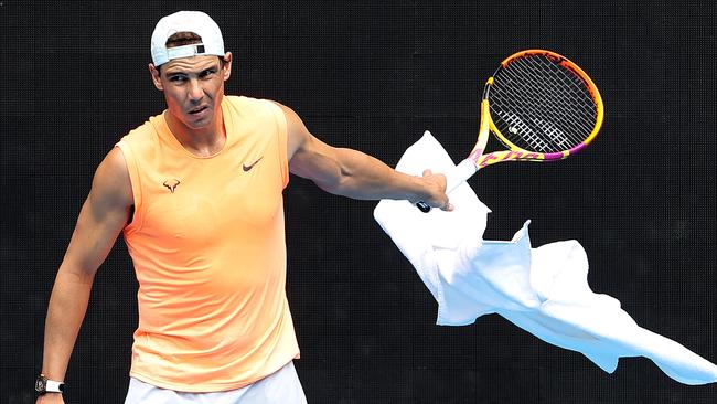 Rafael Nadal has only just begun serving in practise as he deals with a back problem