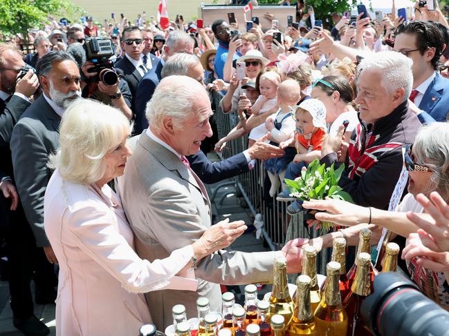Queen Camilla and King Charles III meet members of the public at a community event in Lansdowne Park. Picture: Getty Images