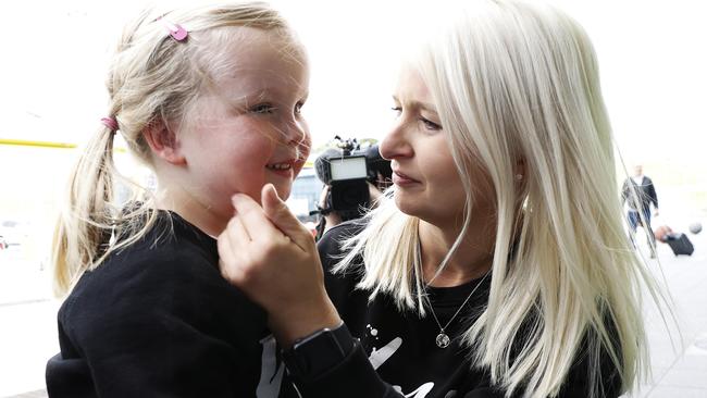 Sadie Myors, 4 is reunited with her aunty Emily Myors. Picture: Zak Simmonds