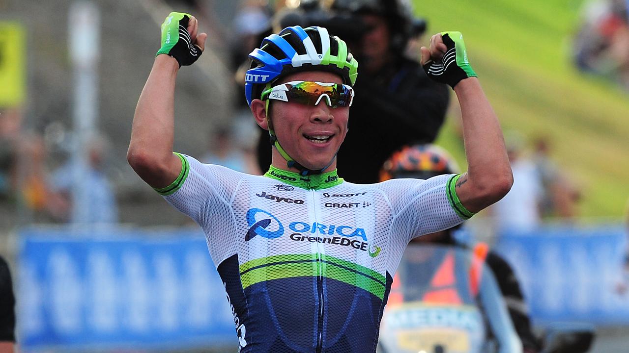 Last two men standing. Orica Green Edge's Caleb Ewan celebrates his first stage win as a pro against New Zealand National Team's Greg Henderson at the conclusion of stage one of the Mitchelton Bay Cycling Classic elite mens race at Ritchie Boulevard. Picture: Leanne Kelly