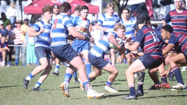 Ryan Heaton rucking the ball up for Nudgee.