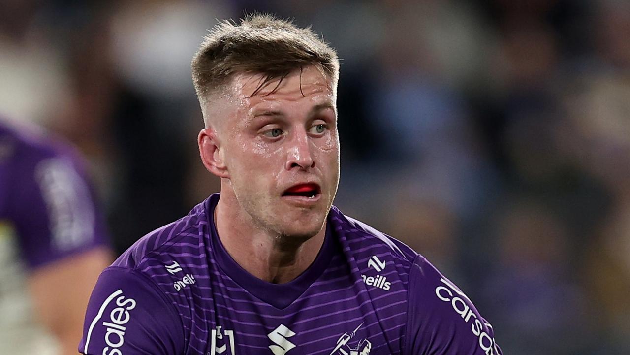 Melbourne Storm star Cameron Munster says he does not want to ‘ruin it for everyone’ by disrupting the side’s cohesion when he returns. Picture: Brendon Thorne / Getty Images