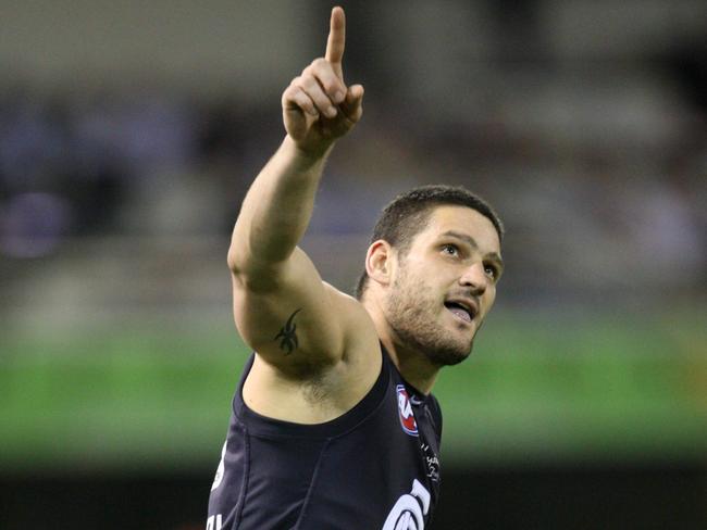 Brendan Fevola celebrates a goal for Carlton. 