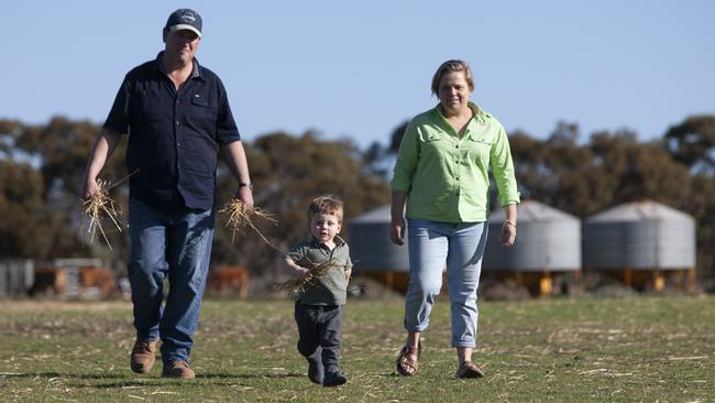 Fifth generation farmer Karl Zerner wife Emily Buddle and their toddler son Charlie, 21 months … love life on the land. Picture: Brett Hartwig