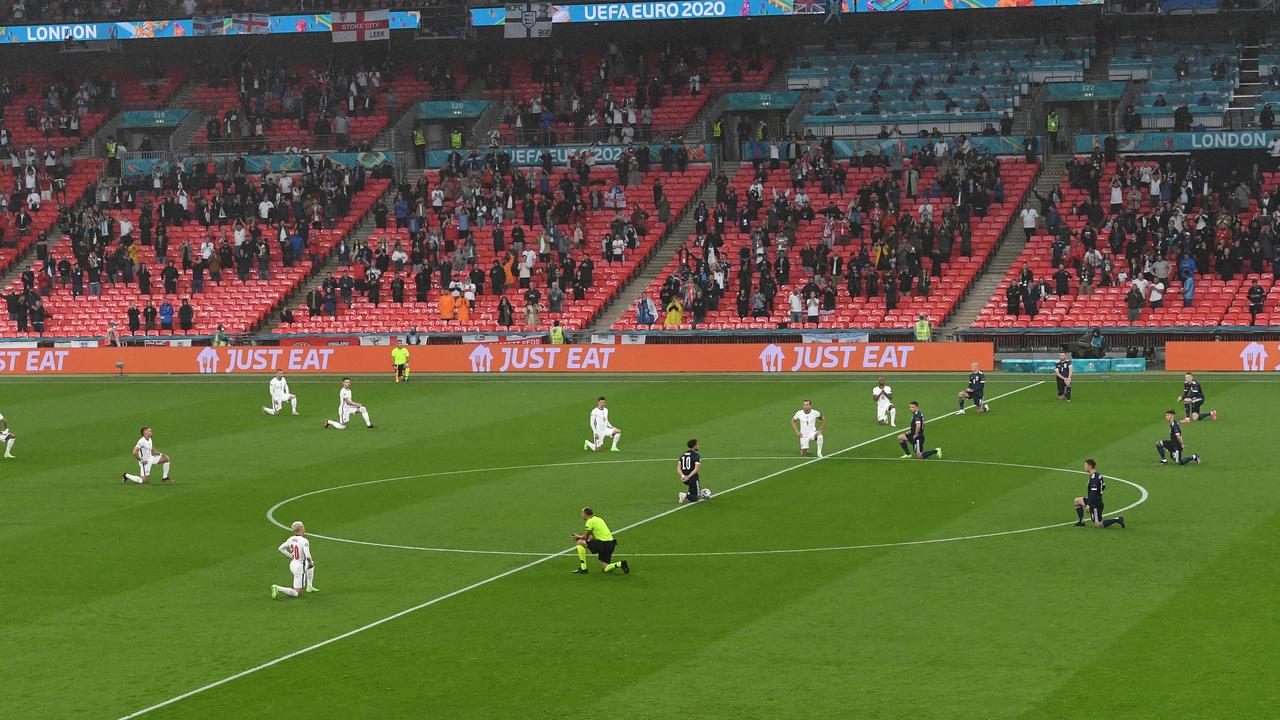 Players from both teams took the knee.