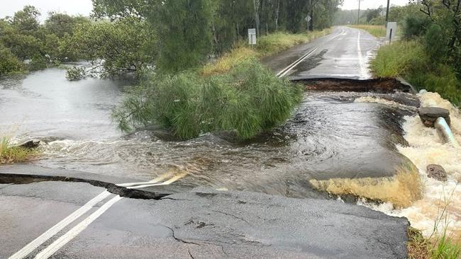 Foreshore Drive, Corlette, in the Port Stephens area, was submerged and broken apart by flooding. Picture: supplied Port Stephens Council