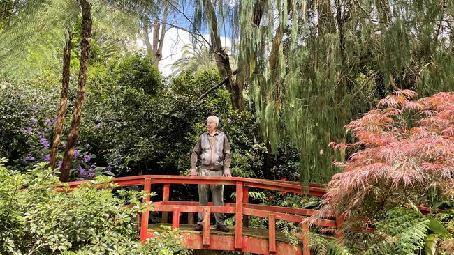 Bill Fleming in the Chinese garden part of his property at Galston.