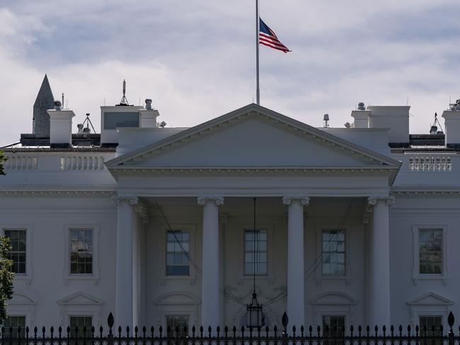 The US flag flies at half-mast above the White House in Washington, DC, on September 19, 2020 after the passing of US Supreme Court Justice Ruth Bader Ginsburg. - Ginsburg died September 18, opening a crucial vacancy on the high court expected to set off a pitched political battle at the peak of the presidential campaign. (Photo by Alex Edelman / AFP)