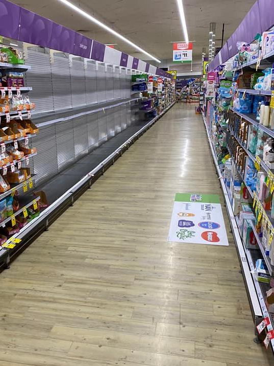 Shoppers have emptied shelves of toilet paper at Northbridge Woolworths in Sydney. Picture: Twitter