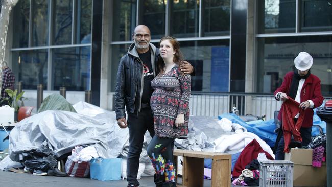 Homeless people in Martin Place are being moved in to temporary accomodation including hotels around sydney. Pictured is Lanz Preistley and his pregnant partner Nina Wilson who is having Lanz's twelfth child.