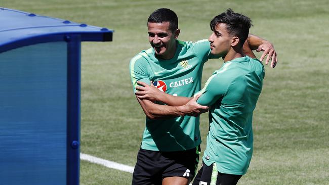 The Socceroos hold a training session at Stadium Trudovye Rezervy in Kazan after their 1-1 draw with Denmark in Samara yesterday. Tim Cahill and Daniel Arzani muck around during training.  Picture: Toby Zerna
